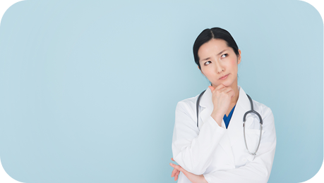 PBR Blog Medical professional in lab coat with stethoscope thinking against light blue background. Represents healthcare decision making and problem solving by a doctor or nurse.