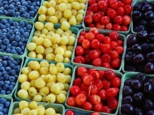 Colorful variety of fruits in baskets, symbolizing the phrase 'Variety - the spice of life and the key to SUCCESS!' for passing the Pediatrics Board Exam.