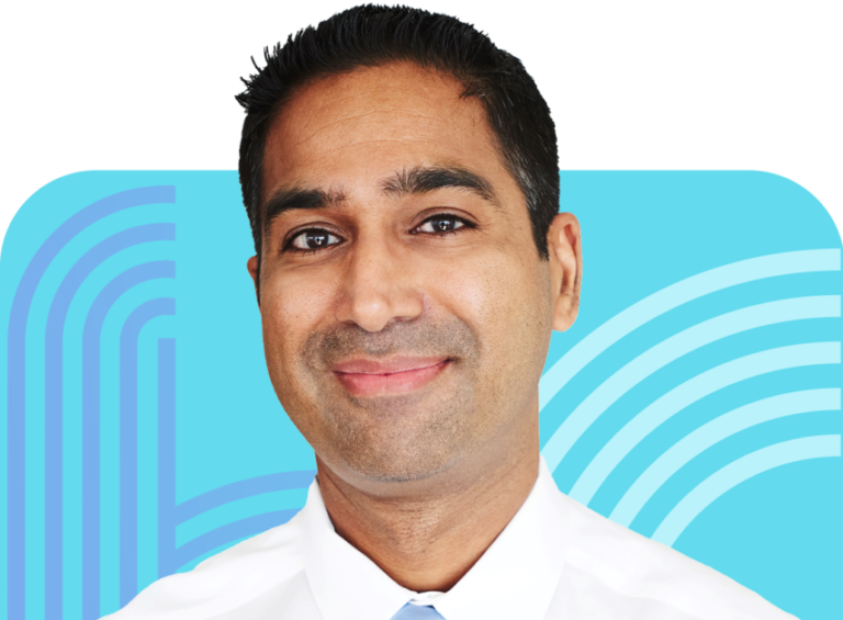 Portrait of Dr. Ashish Goyal, founder of Pediatrics Board Review, wearing a white shirt and light blue tie against a blue background.