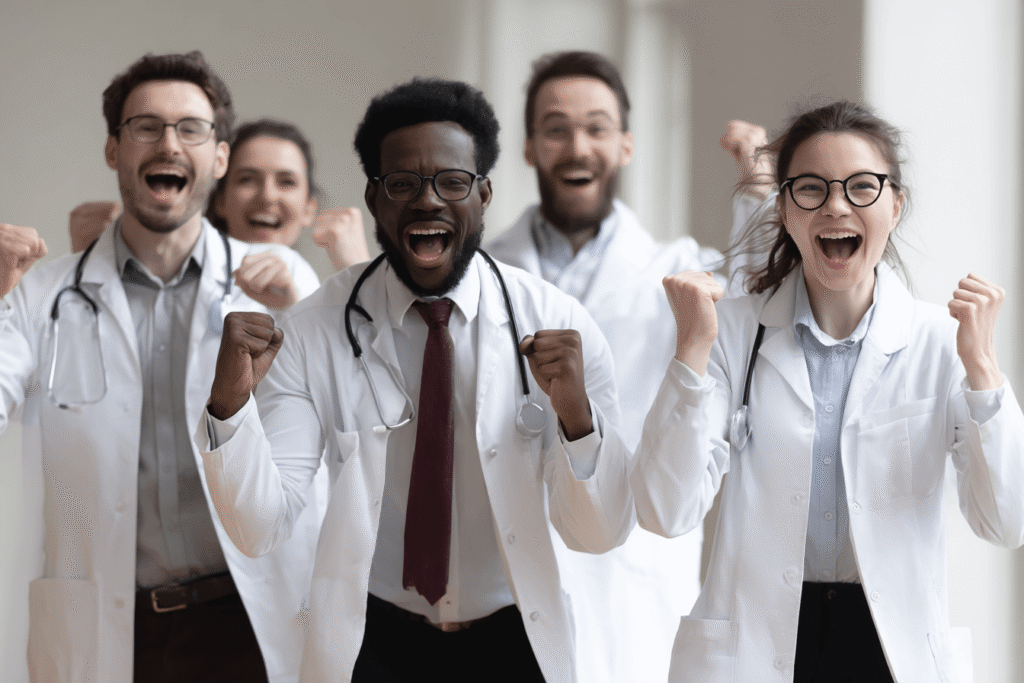 Online Video Course Group of pediatricians celebrating board exam success after using PBR study bundles