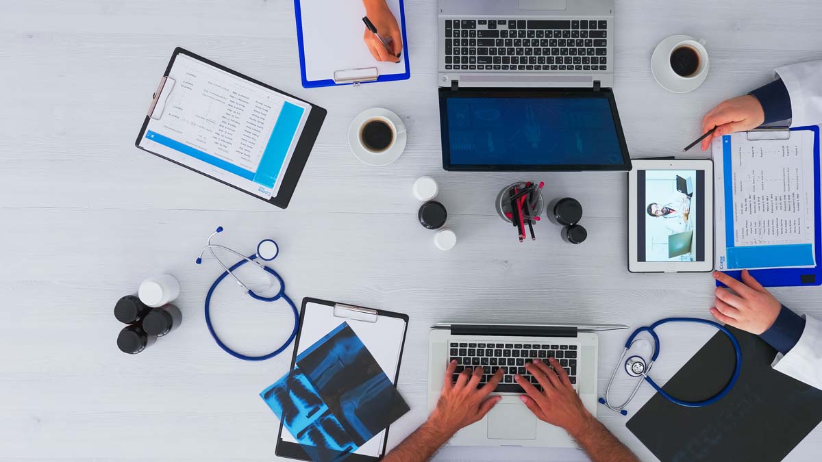 Physicians studying at a table